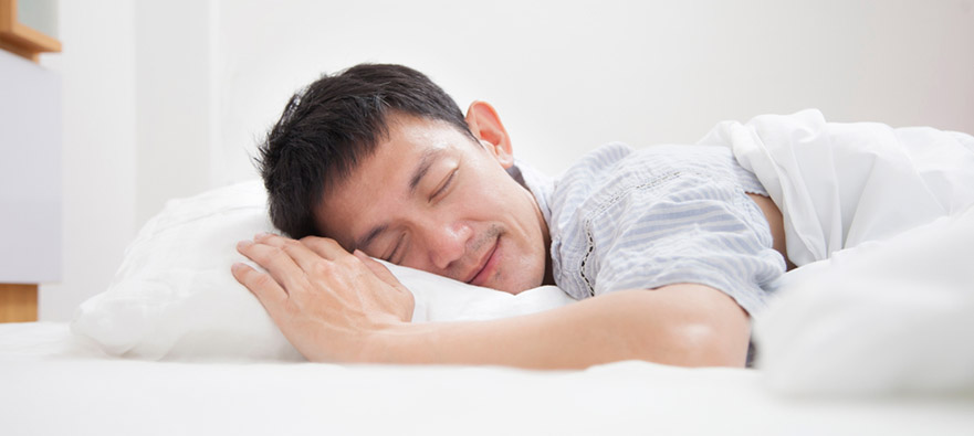 Photograph of a man peacefully sleeping